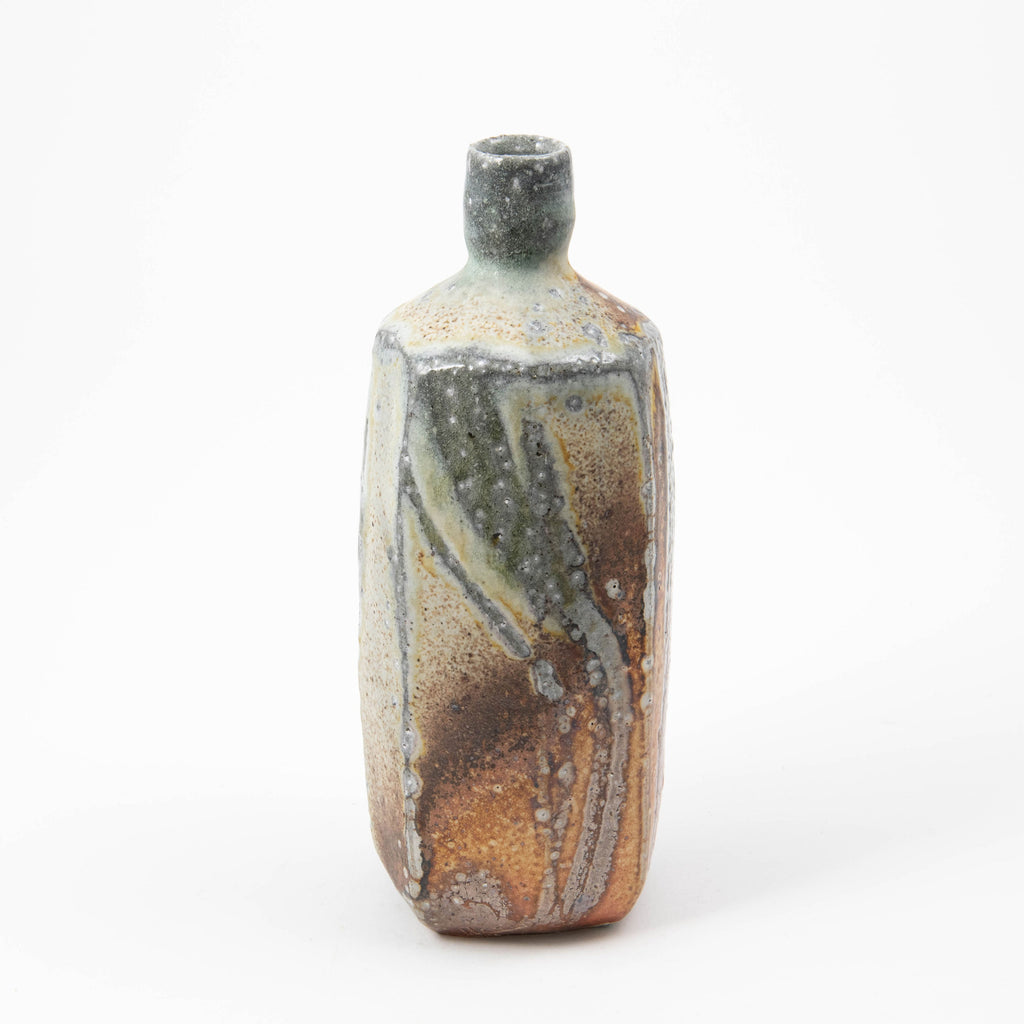 Bouteille carrée – Soda bronzant
