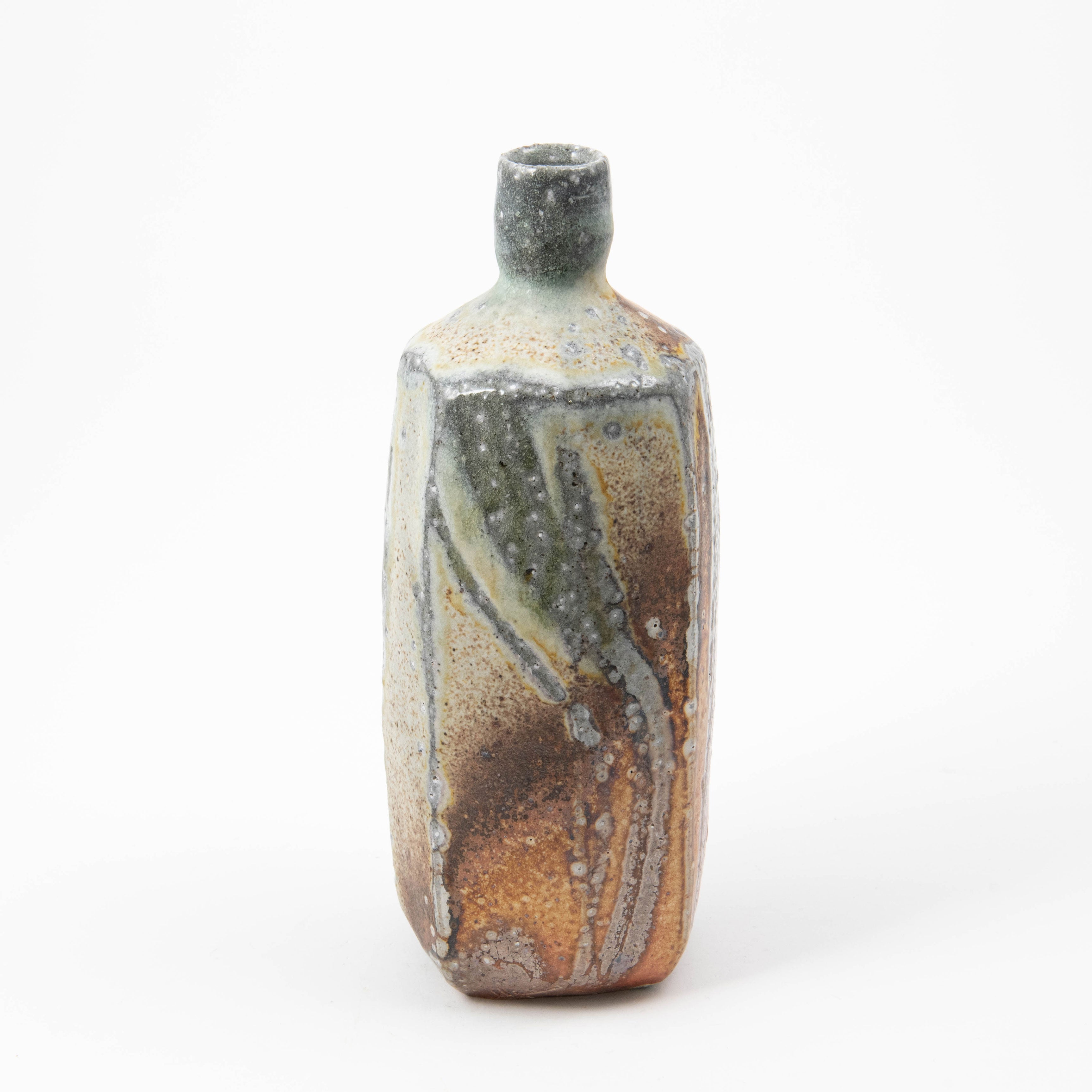 Bouteille carrée – Soda bronzant