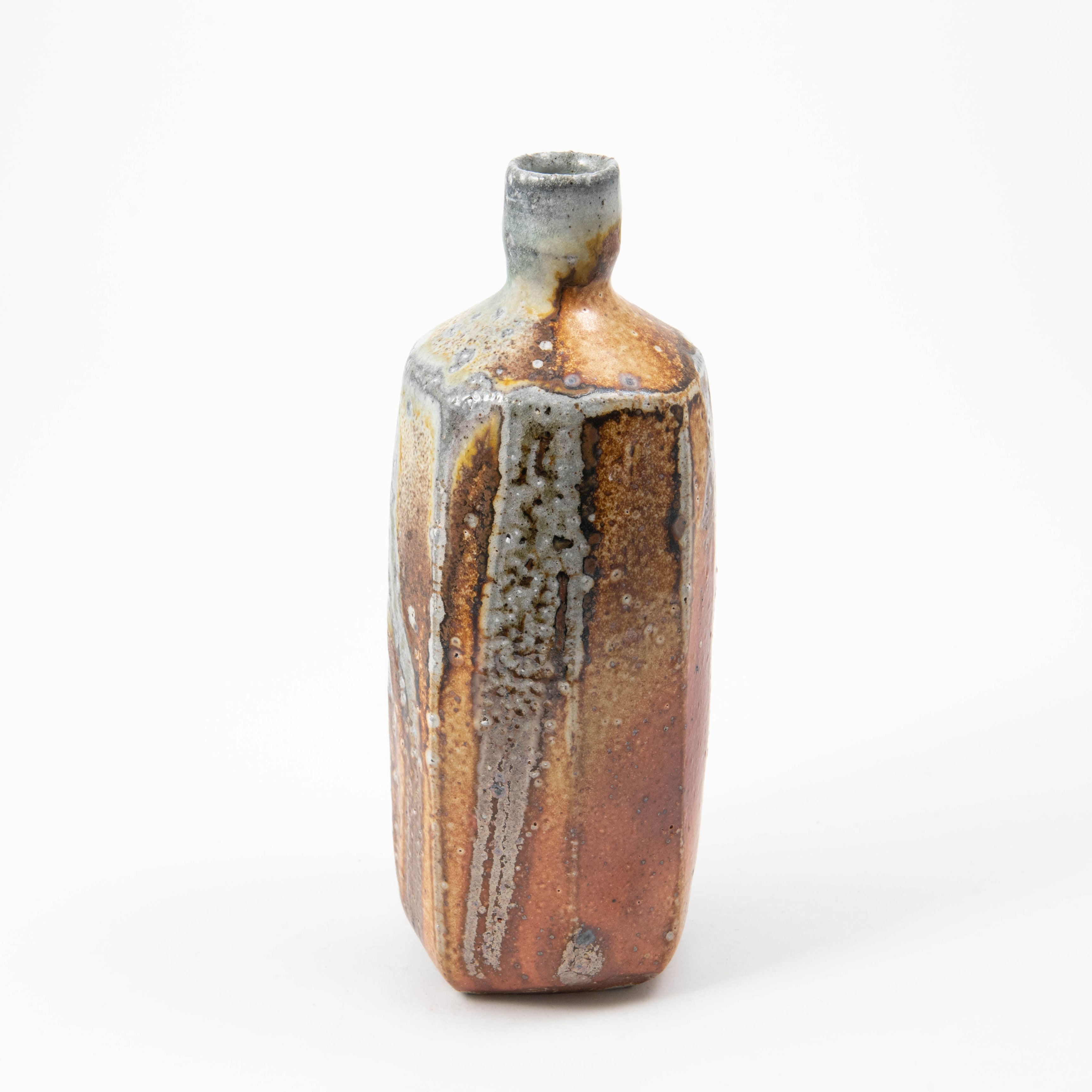 Bouteille carrée – Soda bronzant